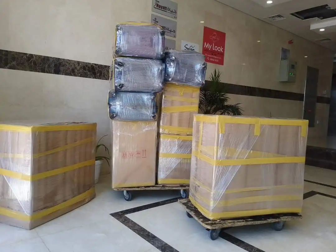 Professional movers and packers in Dubai, Sharjah and Ajman loading furniture