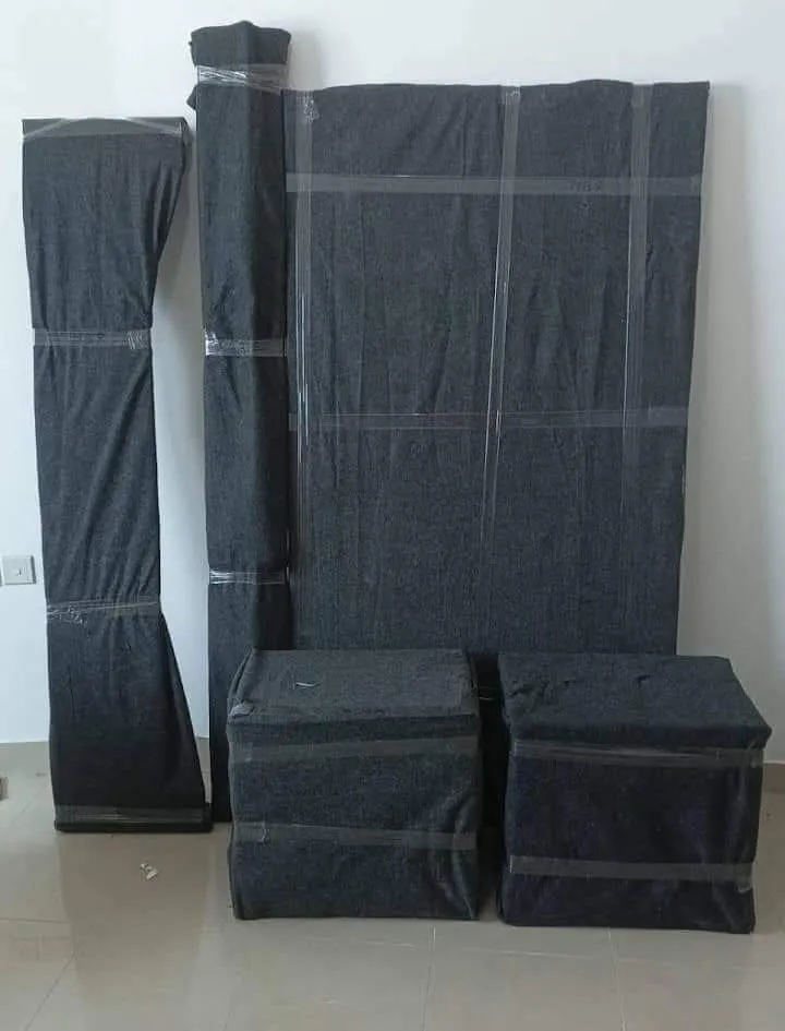 Movers loading furniture into truck in Dubai